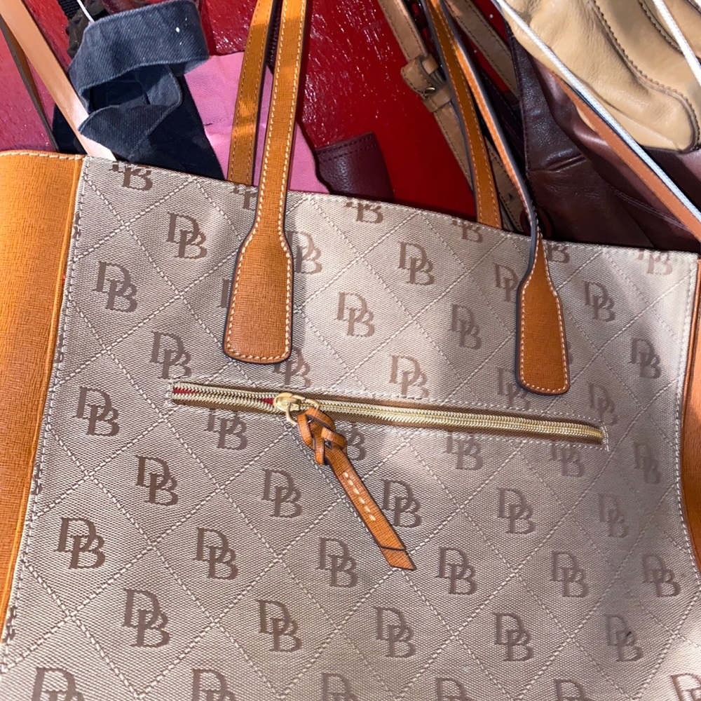 Brown cloth and leather dooney and bourke bag